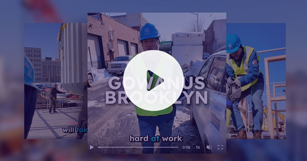 White play button is center screen on top of an image from a Con Edison LinkedIn post featuring an electric utility line worker on-site