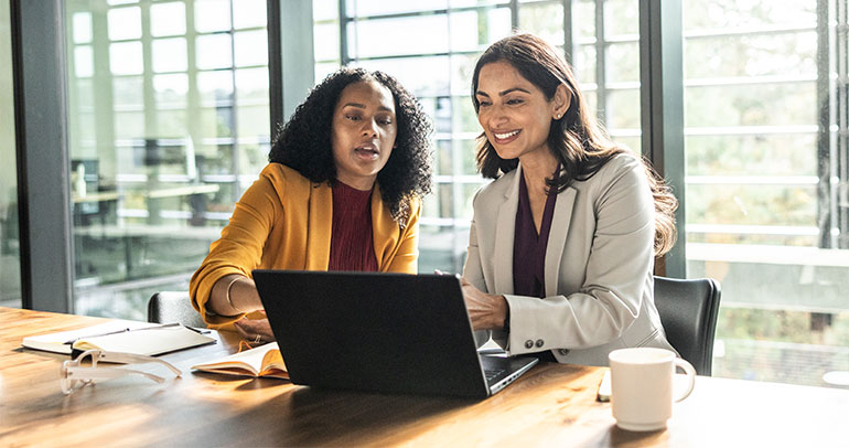Coworkers at an office working collaboratively